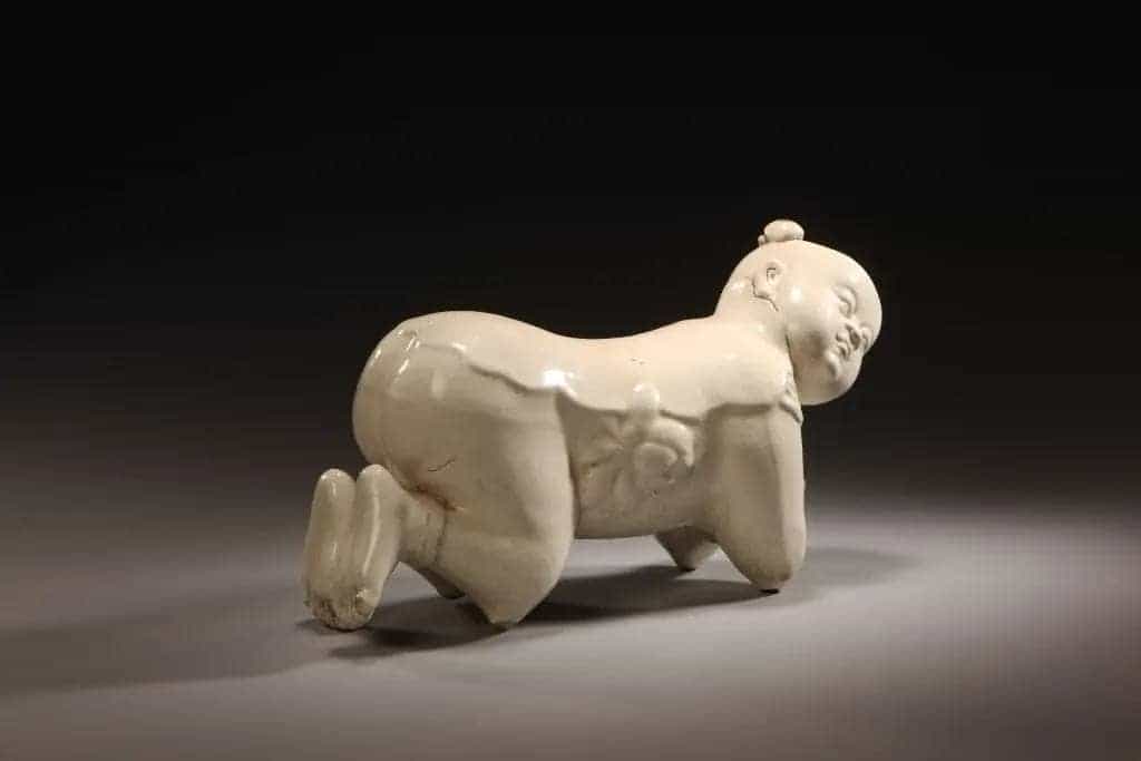 彭城窑仿定窑白釉孩儿枕 - 故宫陶瓷器藏品_第2张
