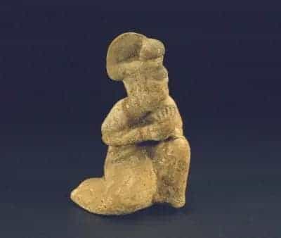 黄釉吹排箫女陶俑 - 故宫雕塑类藏品_第1张